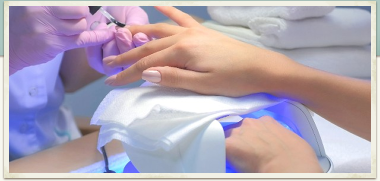 relaxing spa manicure with red polish