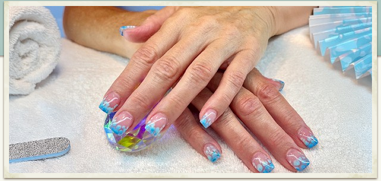 floating Blue & white bubble nail art on sheer pink polish